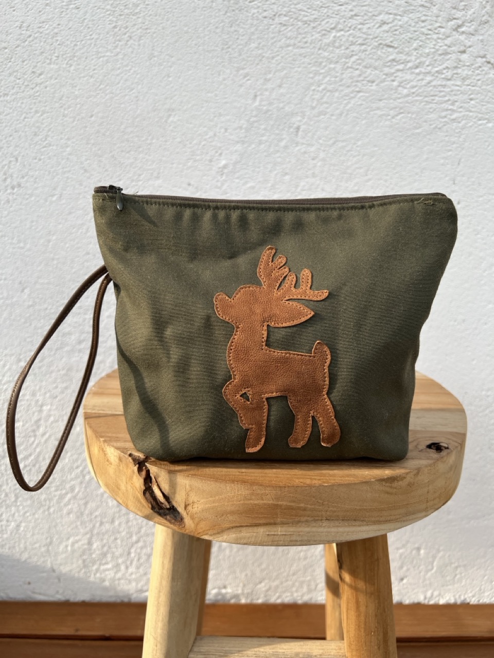 Pochette verde Cerbiatto